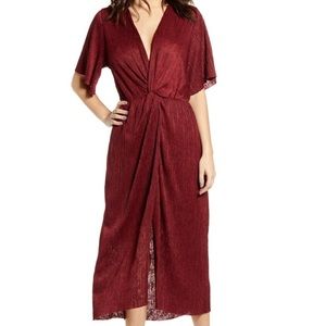 Red midi dress with textured fabric for a flattering fit!